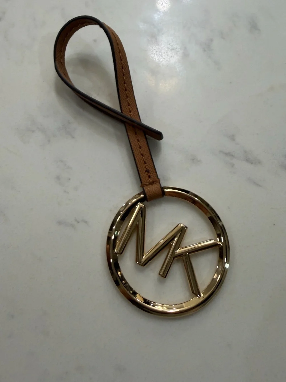 Michael Kors Gold-Tone TM Circle Charm with Tan Strap